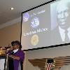 Luna Isaac Mishoe's daughter Rev. Rita Mishoe Paige addresses the audience